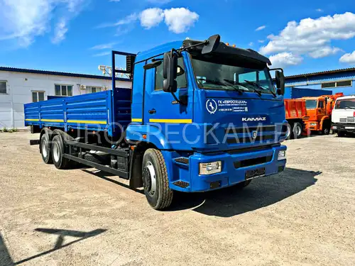 Бортовой автомобиль КАМАЗ 65117 тентованный